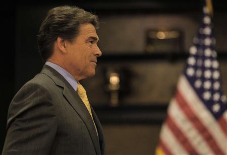 Republican presidential candidate Texas Governor Rick Perry listens to voter's question at an economic forum in Hampton Republican presidential candidate Texas Governor Rick Perry listens to voter's question at an economic forum in Hampton