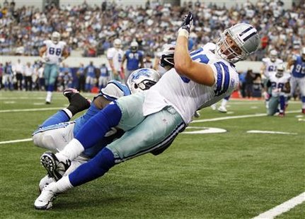 Cowboys tight end Phillips is tackled by Lions linebacker Tulloch in Arlington, Texas Cowboys tight end Phillips is tackled by Lions linebacker Tulloch in Arlington, Texas