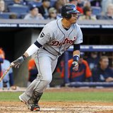 Detroit Tigers' Victor Martinez hits an RBI single against the New York Yankees in Game 2 of their MLB American League Division Series baseb Detroit Tigers' Victor Martinez hits an RBI single against the New York Yankees in Game 2 of their MLB American League Division Series baseb