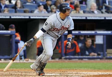 Detroit Tigers' Victor Martinez hits an RBI single against the New York Yankees in Game 2 of their MLB American League Division Series baseb Detroit Tigers' Victor Martinez hits an RBI single against the New York Yankees in Game 2 of their MLB American League Division Series baseb