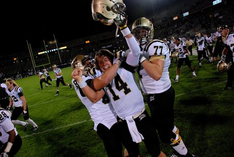 WMU quarterback Alex Carder celebrates with teammates following a 38-31 win at UConn, Oct 1, 2011. WMU quarterback Alex Carder celebrates with teammates following a 38-31 win at UConn, Oct 1, 2011.