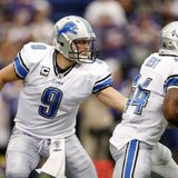 Detroit Lions quarterback Matthew Stafford (L) hands the ball off to Lions running back Jahvid Best during the fourth quarter of their NFC football game against the Minnesota Vikings in Minneapolis September 25, 2011. Detroit won the game in overtime. REUTERS/Eric Miller (UNITED STATES - Tags: SPORT FOOTBALL)