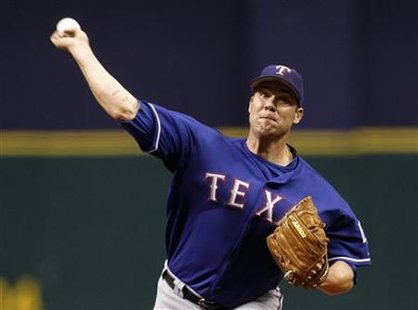 Rangers' Lewis throws against the Rays in their MLB American League Divisional Series baseball playoffs in St. Petersburg Rangers' Lewis throws against the Rays in their MLB American League Divisional Series baseball playoffs in St. Petersburg