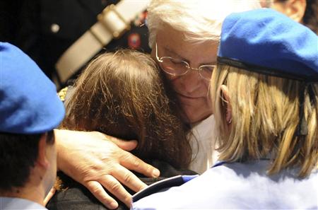 Amanda Knox embraces her lawyer Luciano Ghirga after hearing the verdict in Perugia Amanda Knox embraces her lawyer Luciano Ghirga after hearing the verdict in Perugia