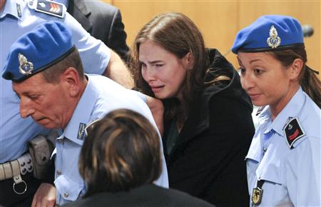 Amanda Knox reacts after hearing the verdict during her appeal trial in Perugia Amanda Knox reacts after hearing the verdict during her appeal trial in Perugia