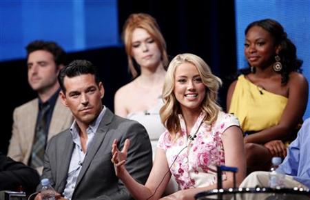 Heard speaks during the NBC Universal session for "The Playboy Club" at the 2011 Summer Television Critics Association Cable Press Tour in B Heard speaks during the NBC Universal session for "The Playboy Club" at the 2011 Summer Television Critics Association Cable Press Tour in B