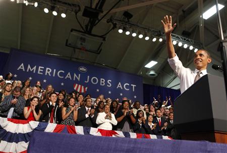 U.S. President Barack Obama waves before he speaks about the Americans Job Act at Eastfield College in Texas U.S. President Barack Obama waves before he speaks about the Americans Job Act at Eastfield College in Texas