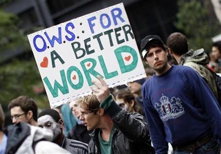 Demonstrator holds a sign during an Occupy Wall Street protest in lower Manhattan in New York Demonstrator holds a sign during an Occupy Wall Street protest in lower Manhattan in New York