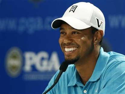 Tiger Woods talks to the media during his news conference before the start of the 93rd PGA Championship golf tournament at the Atlanta Athle Tiger Woods talks to the media during his news conference before the start of the 93rd PGA Championship golf tournament at the Atlanta Athle