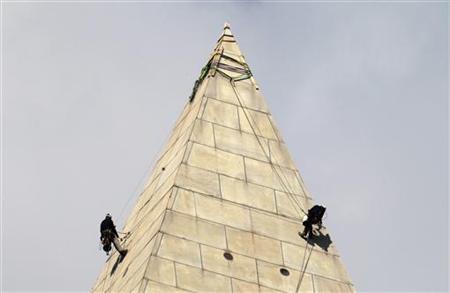 Civil engineers continue their work on the Washington Monument in Washington Civil engineers continue their work on the Washington Monument in Washington