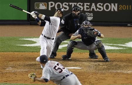 New York Yankees' Nick Swisher strikes out with the bases loaded in the seventh inning of play against the Detroit Tigers in Game 5 of their New York Yankees' Nick Swisher strikes out with the bases loaded in the seventh inning of play against the Detroit Tigers in Game 5 of their