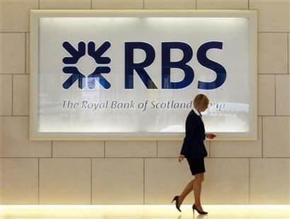 A worker walks in the foyer of a Royal Bank of Scotland office in the City of London A worker walks in the foyer of a Royal Bank of Scotland office in the City of London