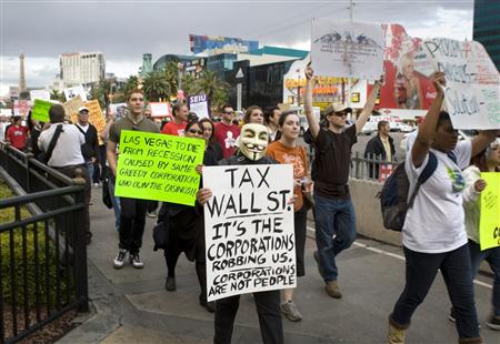 Protesters march on the Las Vegas Strip during an "Occupy Las Vegas" demonstration in Las Vegas Protesters march on the Las Vegas Strip during an "Occupy Las Vegas" demonstration in Las Vegas