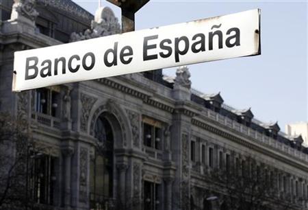 The Bank of Spain is seen behind a sign in Madrid The Bank of Spain is seen behind a sign in Madrid