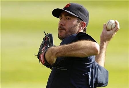 Detroit Tigers' starting pitcher Justin Verlander warms up during a practice in preparation for the MLB American League Championship Series Detroit Tigers' starting pitcher Justin Verlander warms up during a practice in preparation for the MLB American League Championship Series