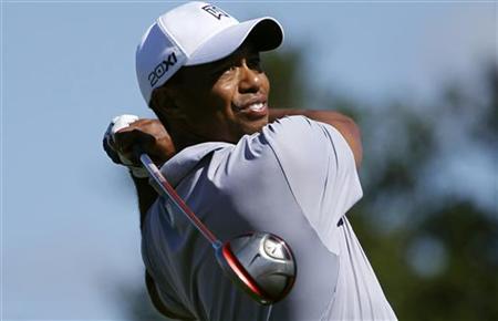 Tiger Woods hits his tee shot at the fourth hole during the second round of a PGA Tour golf tournament in San Martin Tiger Woods hits his tee shot at the fourth hole during the second round of a PGA Tour golf tournament in San Martin