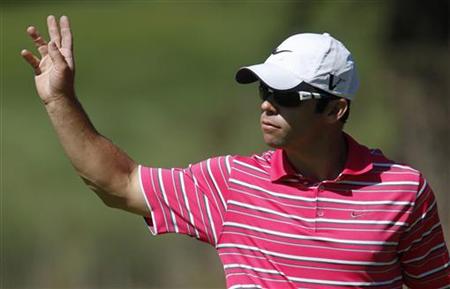 Paul Casey of Britain waves to the gallery after making birdie at the 18th hole during the second round of a PGA Tour golf tournament in San Paul Casey of Britain waves to the gallery after making birdie at the 18th hole during the second round of a PGA Tour golf tournament in San
