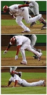 Combination photo shows Phillies' Howard falling down while running to first base during their MLB baseball playoff game against Cardinals i Combination photo shows Phillies' Howard falling down while running to first base during their MLB baseball playoff game against Cardinals i