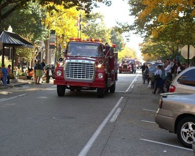 A vintage fire truck makes its way down 8th Street in downtown Holland during the 29th Holland Fire Truck Parade on Oct. 8, 2011. A vintage fire truck makes its way down 8th Street in downtown Holland during the 29th Holland Fire Truck Parade on Oct. 8, 2011.