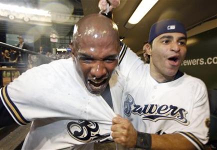 Milwaukee Brewers' center fielder Nyjer Morgan (L) celebrates with teammate Jerry Hairston Jr. after defeating the Arizona Diamondbacks to win Game 5 in their MLB National League Divisional League Series baseball playoff game in Milwaukee October 7, 2011. Credit: Reuters/Jeff Haynes Milwaukee Brewers' center fielder Nyjer Morgan (L) celebrates with teammate Jerry Hairston Jr. after defeating the Arizona Diamondbacks to win Game 5 in their MLB National League Divisional League Series baseball playoff game in Milwaukee October 7, 2011. Credit: Reuters/Jeff Haynes