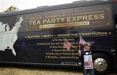 A man carries a U.S. flag during a Tea Party rally in Napa, California A man carries a U.S. flag during a Tea Party rally in Napa, California