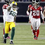 Packers tight end Finley celebrates a first down in front of Atlanta Falcons defense in the second half of their NFL football game against t Packers tight end Finley celebrates a first down in front of Atlanta Falcons defense in the second half of their NFL football game against t