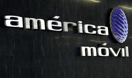 The logo of America Movil is seen in the company's new corporate offices in Mexico City The logo of America Movil is seen in the company's new corporate offices in Mexico City