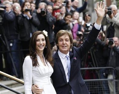 Singer Paul McCartney and his bride Nancy Shevell leave after their marriage ceremony at Old Marylebone Town Hall in London Singer Paul McCartney and his bride Nancy Shevell leave after their marriage ceremony at Old Marylebone Town Hall in London