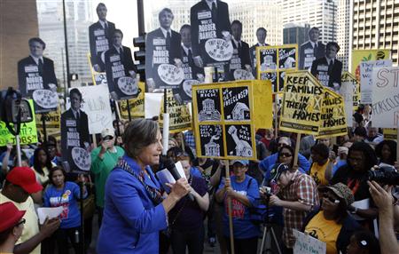 U.S. Representative Schakowksy speaks to members of a coalition called "Stand up Chicago" protest outside the Mortgage Bankers Association's U.S. Representative Schakowksy speaks to members of a coalition called "Stand up Chicago" protest outside the Mortgage Bankers Association's