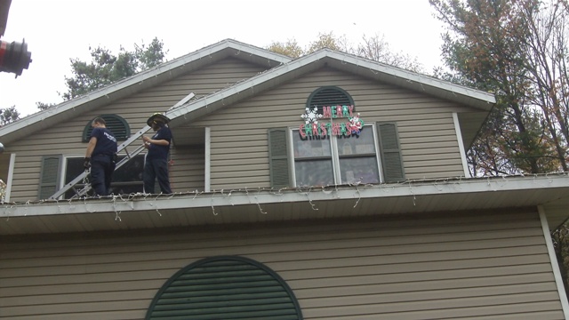 Kayleigh in Rib Mountain might not make it to Christmas. So today (Oct 11, 2011), the Rib Mountain Fire Department and Edgar High School students were there at the house to decorate so Kayleigh can have Christmas now. Mike Mathers was there playing Christmas music.