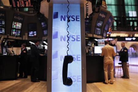 A phone hangs above the floor of the New York Stock Exchange A phone hangs above the floor of the New York Stock Exchange