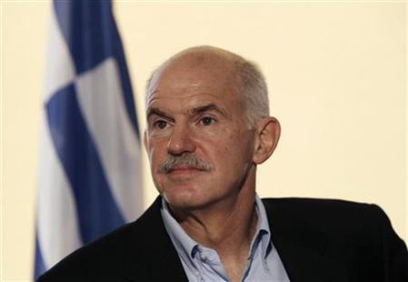 Greek Prime Minister Papandreou is seen during a visit at the police headquarters in Athens