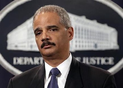 Eric Holder holds a news conference to deliver the results to date of the largest prosecution of an international criminal network organized Eric Holder holds a news conference to deliver the results to date of the largest prosecution of an international criminal network organized