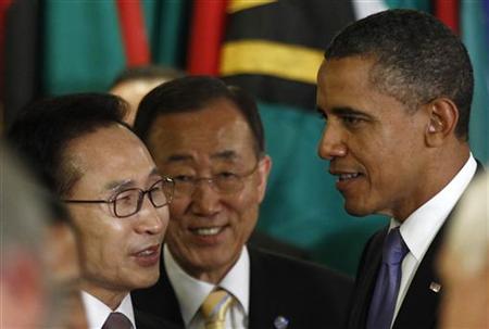 President Barack Obama talks with South Korean President Lee Myung-bak and U.N. Secretary General Ban Ki-moon during lunch at the U.N. Gener President Barack Obama talks with South Korean President Lee Myung-bak and U.N. Secretary General Ban Ki-moon during lunch at the U.N. Gener