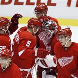 Detroit Red Wings' Howard is congratulated by teammates after beating the Vancouver Canucks to win their NHL hockey game in Detroit Detroit Red Wings' Howard is congratulated by teammates after beating the Vancouver Canucks to win their NHL hockey game in Detroit