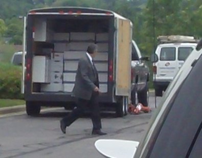 FBI agents search the Manson Insurance offices in June 2010. FBI agents search the Manson Insurance offices in June 2010.
