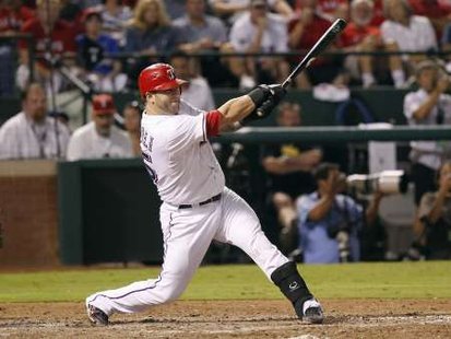 Texas Rangers catcher Mike Napoli, who hit an 8th inning double, driving in 2 runs to pace Texas to a 4-2 win in game 5 of the 2011 World Series on Monday, October 24, 2011. REUTERS Texas Rangers catcher Mike Napoli, who hit an 8th inning double, driving in 2 runs to pace Texas to a 4-2 win in game 5 of the 2011 World Series on Monday, October 24, 2011. REUTERS