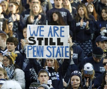 Penn State football fans look on after their loss in an NCAA football game against Nebraska in State College Penn State football fans look on after their loss in an NCAA football game against Nebraska in State College