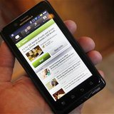 The Groupon smartphone app is seen on a Motorola Droid Bionic cellphone in Denver The Groupon smartphone app is seen on a Motorola Droid Bionic cellphone in Denver