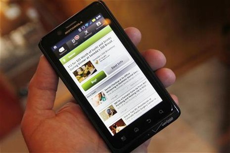 The Groupon smartphone app is seen on a Motorola Droid Bionic cellphone in Denver The Groupon smartphone app is seen on a Motorola Droid Bionic cellphone in Denver