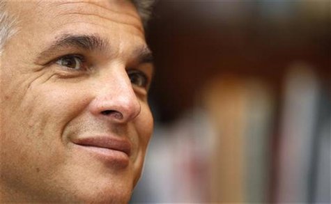 File photo of newly appointed Swiss bank UBS CEO Sergio Ermotti smiling during a Reuters interview in downtown Milan File photo of newly appointed Swiss bank UBS CEO Sergio Ermotti smiling during a Reuters interview in downtown Milan