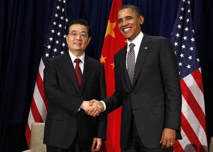 President Barack Obama meets with Chinese President Hu Jintao during the APEC Summit in Honolulu, Hawaii in this November 12, 2011 file phot President Barack Obama meets with Chinese President Hu Jintao during the APEC Summit in Honolulu, Hawaii in this November 12, 2011 file phot