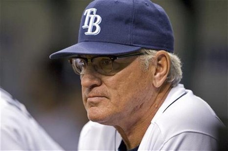 Rays manager Maddon watches his team play the White Sox during the fourth inning of their American League MLB baseball game in St. Petersbur Rays manager Maddon watches his team play the White Sox during the fourth inning of their American League MLB baseball game in St. Petersbur