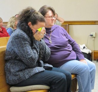 Sally Pergolski's daughter Jamie (left) sobs after learning a jury found her brother Chase Boruch guilty in their mother's murder