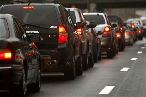 Automobiles wait in a traffic jam on a New York City highway Automobiles wait in a traffic jam on a New York City highway