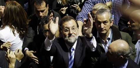 Spain's centre-right People's Party leader Mariano Rajoy waves during a campaign rally in Barcelona Spain's centre-right People's Party leader Mariano Rajoy waves during a campaign rally in Barcelona