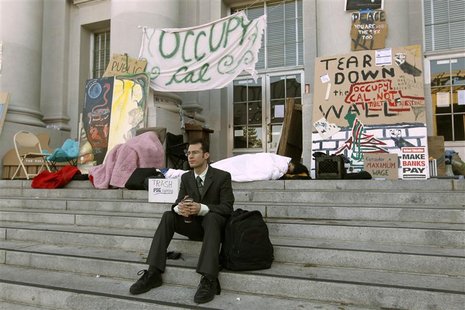 Student Michal Young sits on the steps of Sproul Hall at the University of California Berkeley in Berkeley
