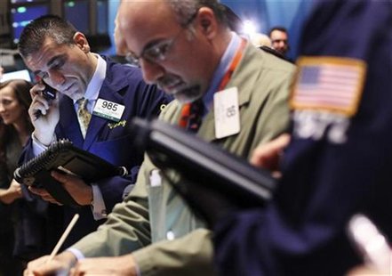 Traders work on the floor of the New York Stock Exchange Traders work on the floor of the New York Stock Exchange