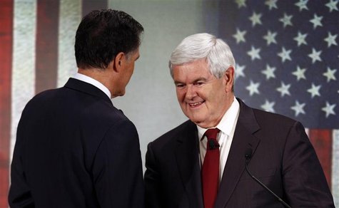 Republican presidential candidate former House of Representatives Speaker Newt Gingrich (R) shakes hands with former Massachusetts Governor Republican presidential candidate former House of Representatives Speaker Newt Gingrich (R) shakes hands with former Massachusetts Governor