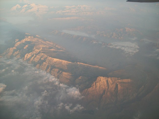 View of Afghan mountains flying into the country.